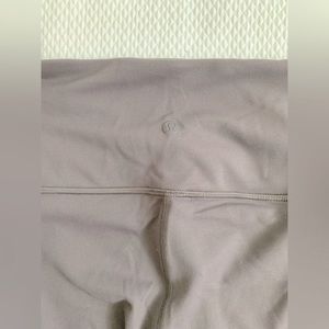 Lululemon leggings. Dark gray with waist control design. Size small.